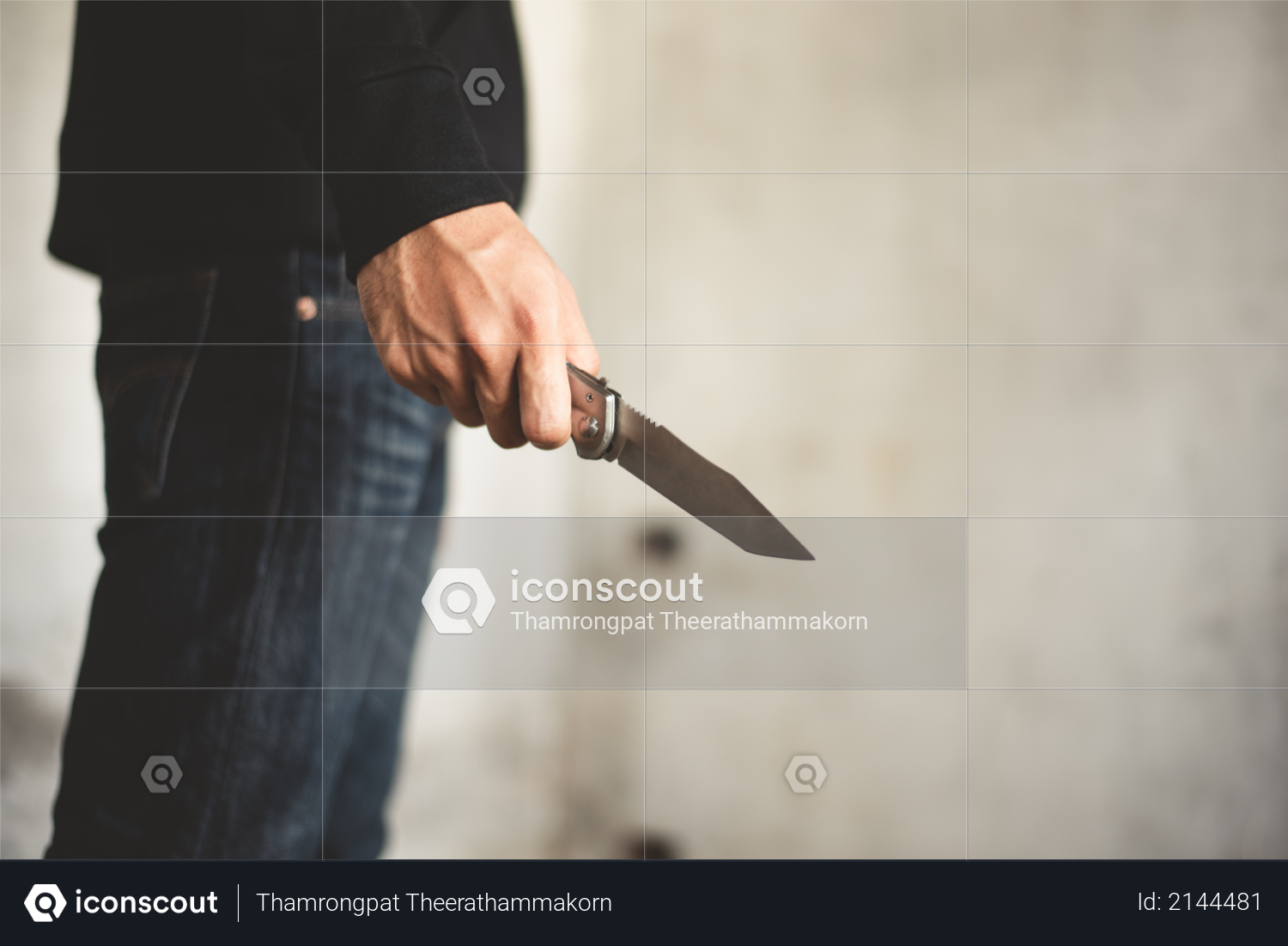 Close up of man holding knife in abandoned house - Terrorist and Robber concept Photo