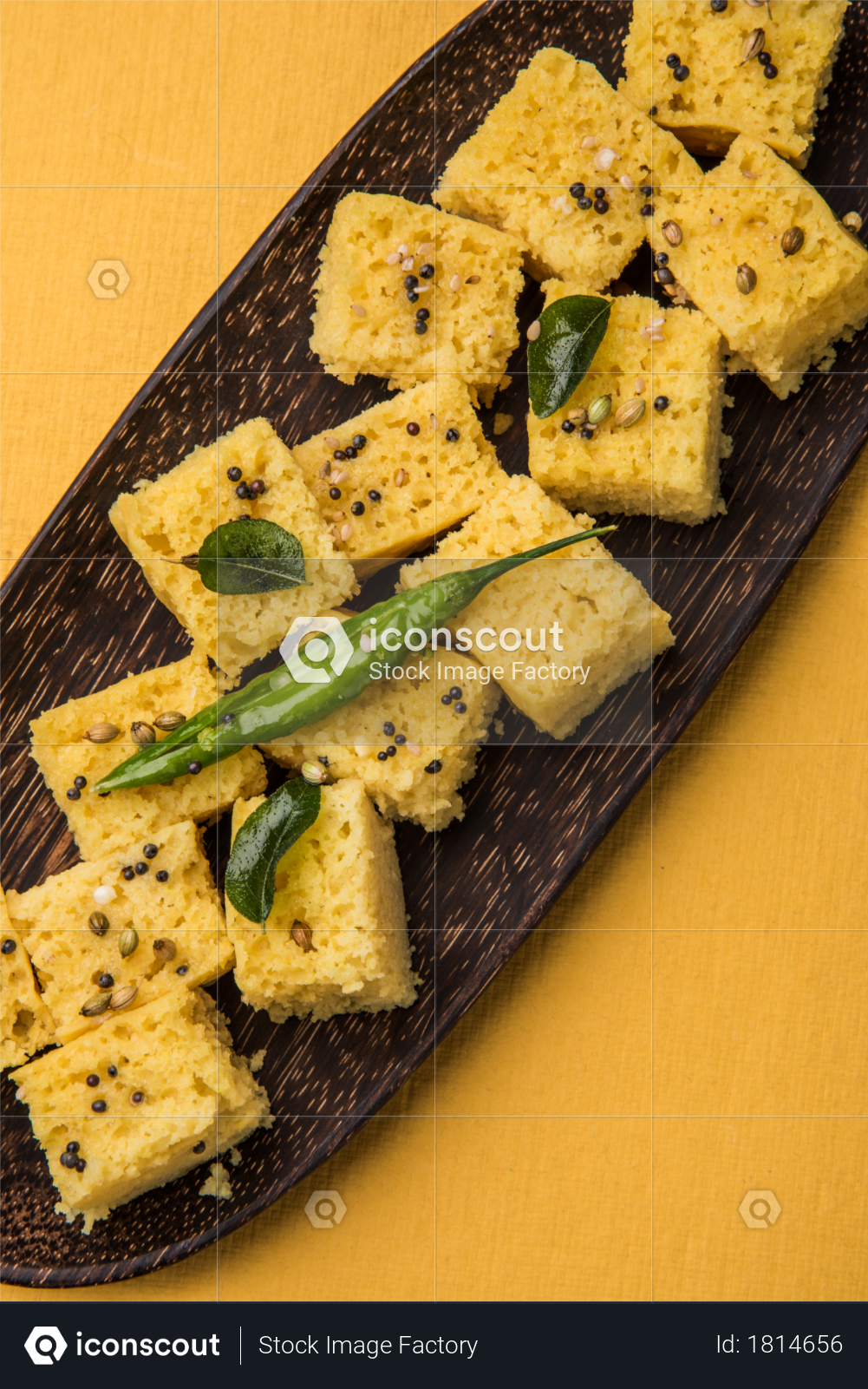 premium closeup of khaman dhokla in serving platter over yellow background photo download in png jpg format premium closeup of khaman dhokla in serving platter over yellow background photo download in png jpg format