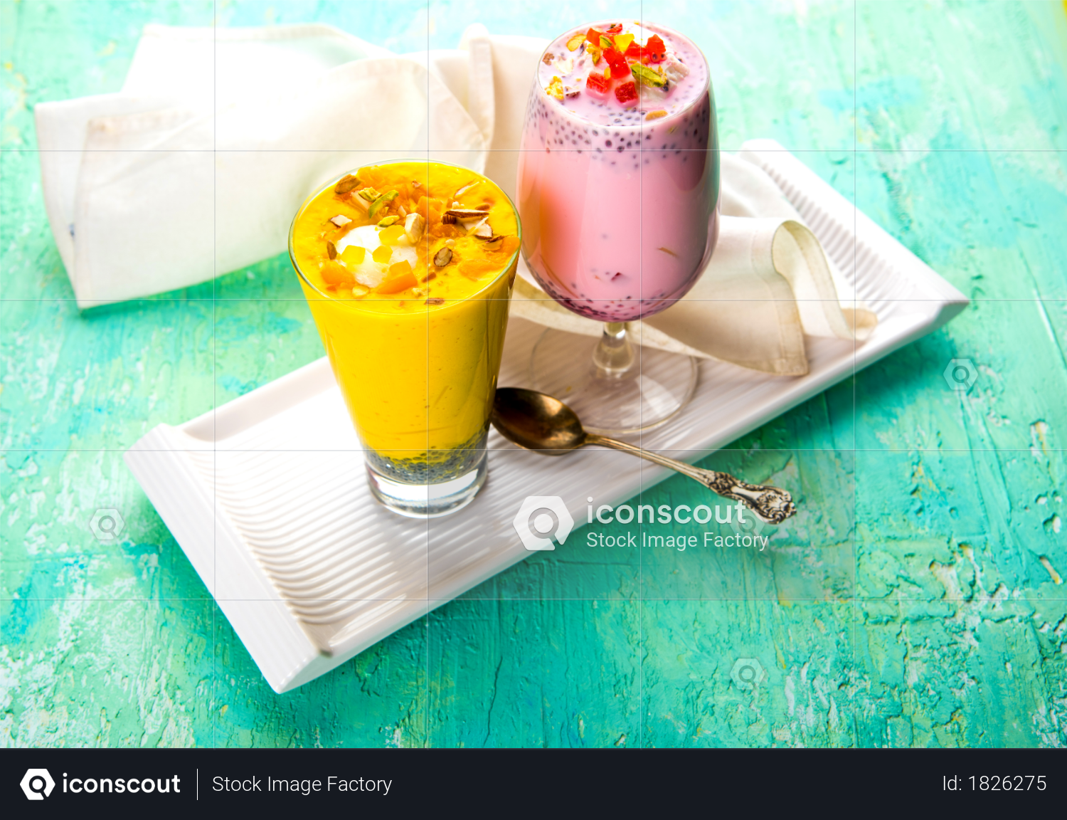 premium falooda or faluda is a popular indian dessert strawberry and mango flavoured which has ice cream noodles sweet basil seeds and nuts selective focus photo download in png jpg iconscout