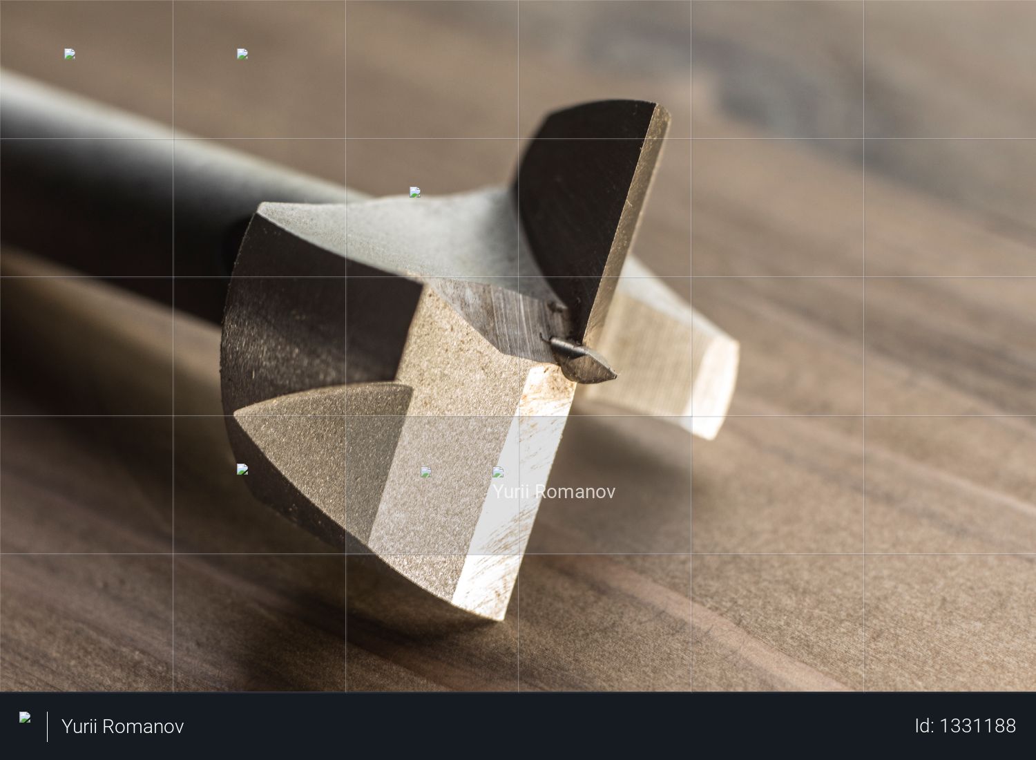 Forstner drill bit on the wooden bakground. joiner woodshop Photo