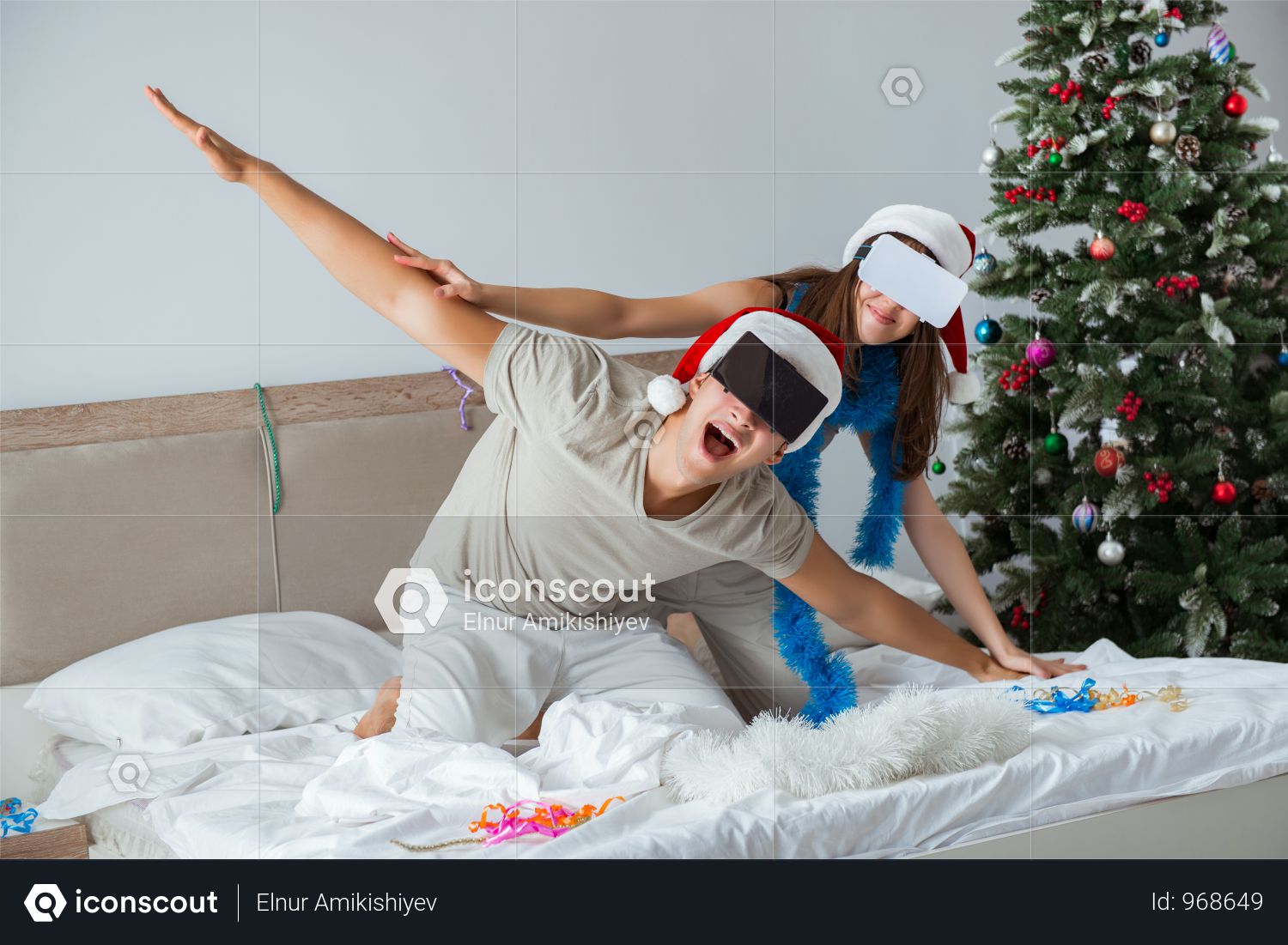 Happy Couple Celebrating Christmas Holiday In Bed Photo