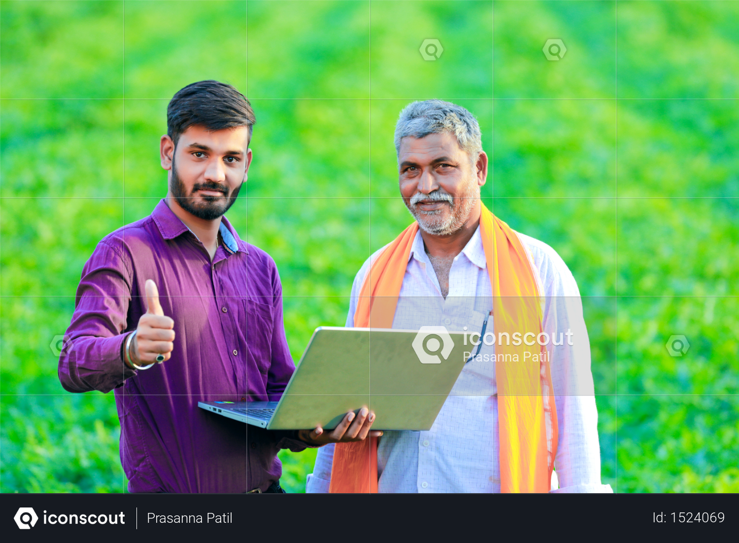 Indian agronomist with farmer at field Photo