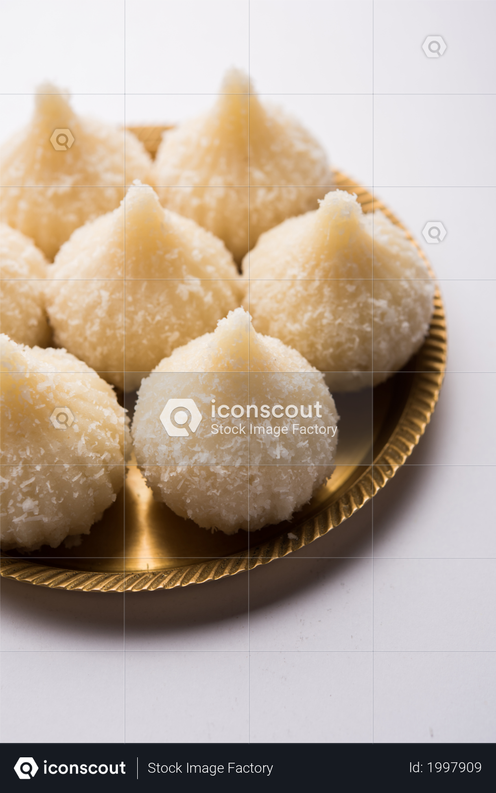 premium indian festival sweet or dessert coconut modak or nariyal modak served in plate photo download in png jpg format premium indian festival sweet or dessert coconut modak or nariyal modak served in plate photo download in png jpg format