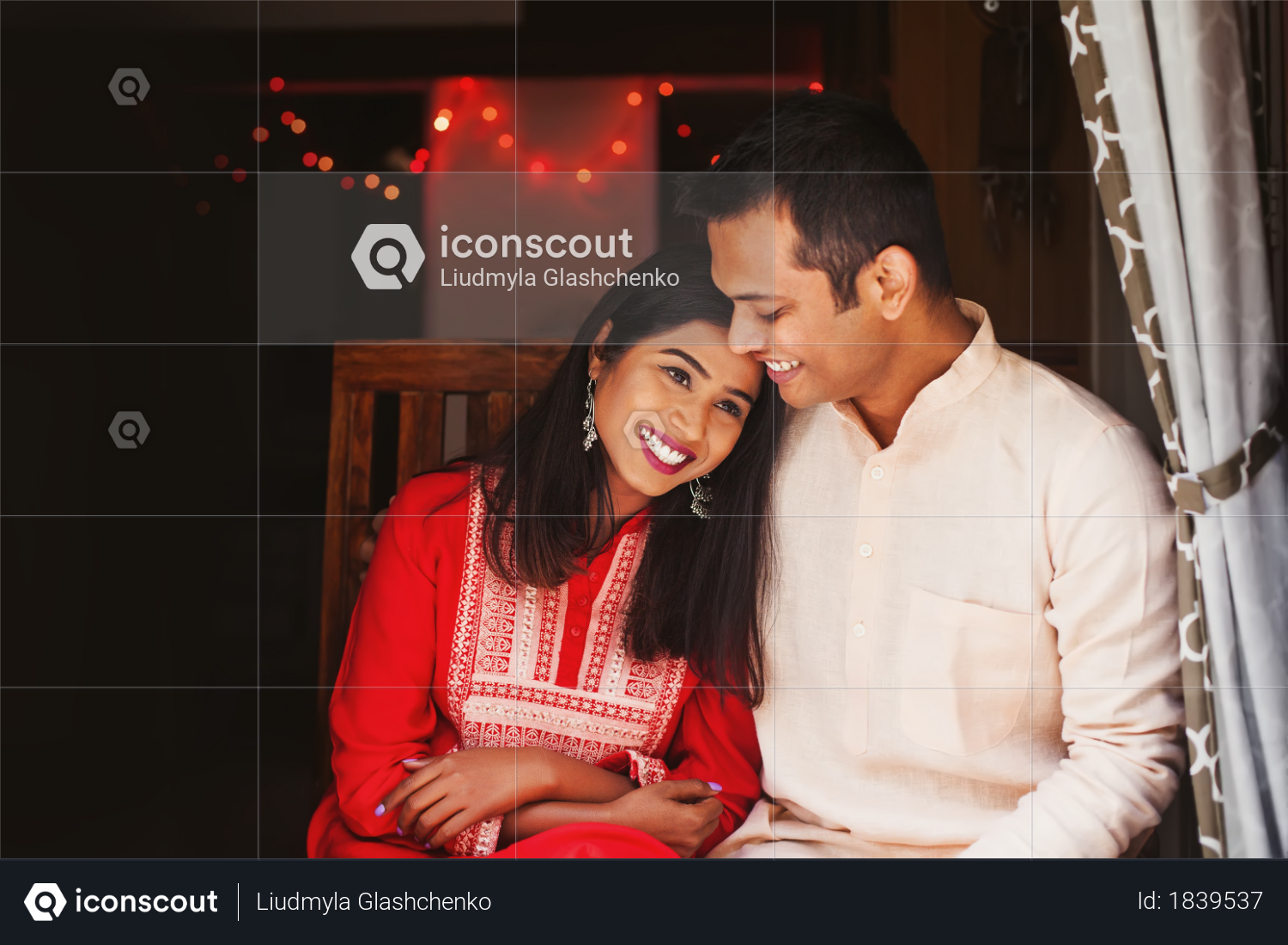 Indian man hugging his wife on karva chauth day Photo