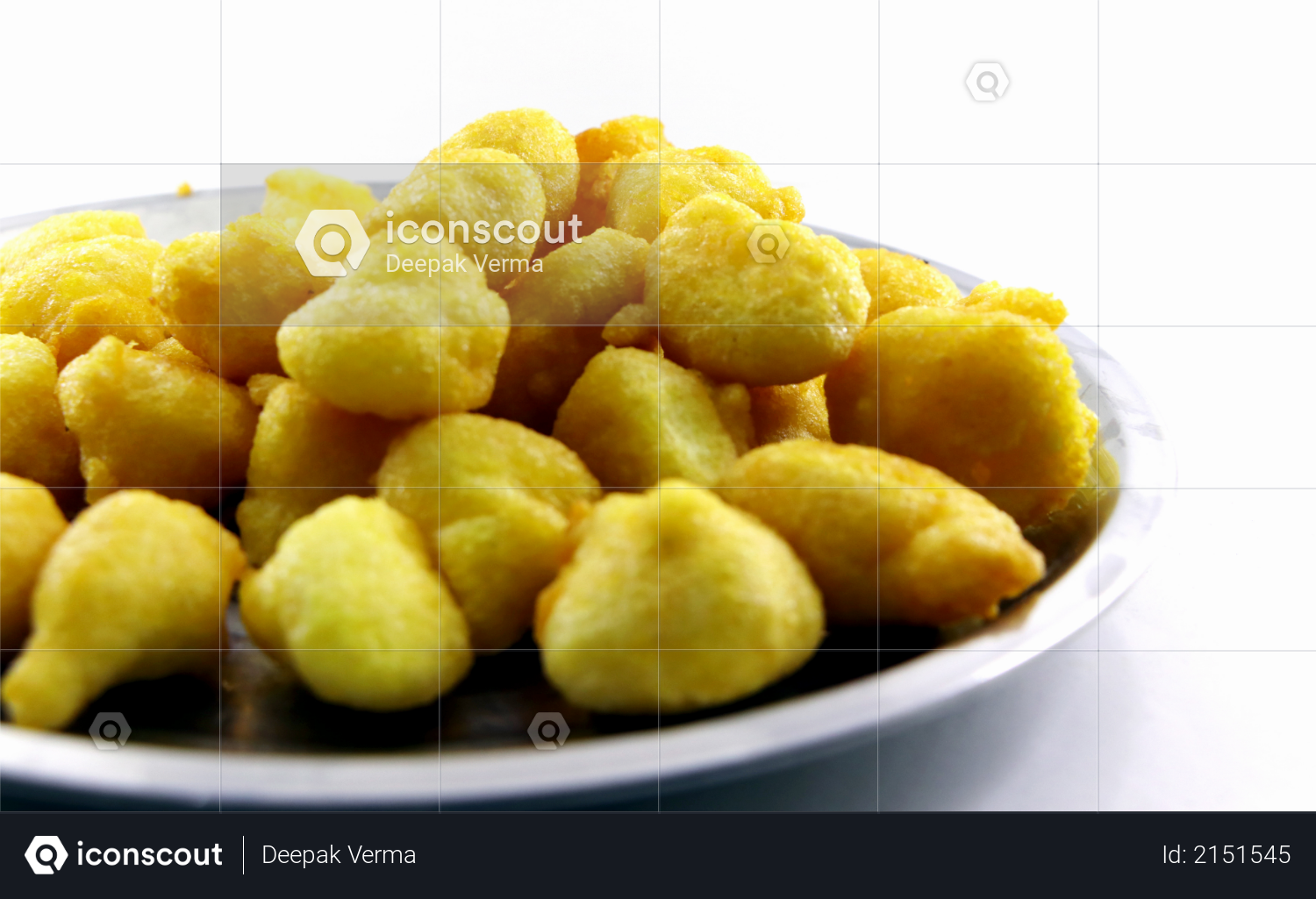 Isolated top view of Basin pakoda or pakora, Top shot of Popular indian or pakistani street food snack on white background Photo