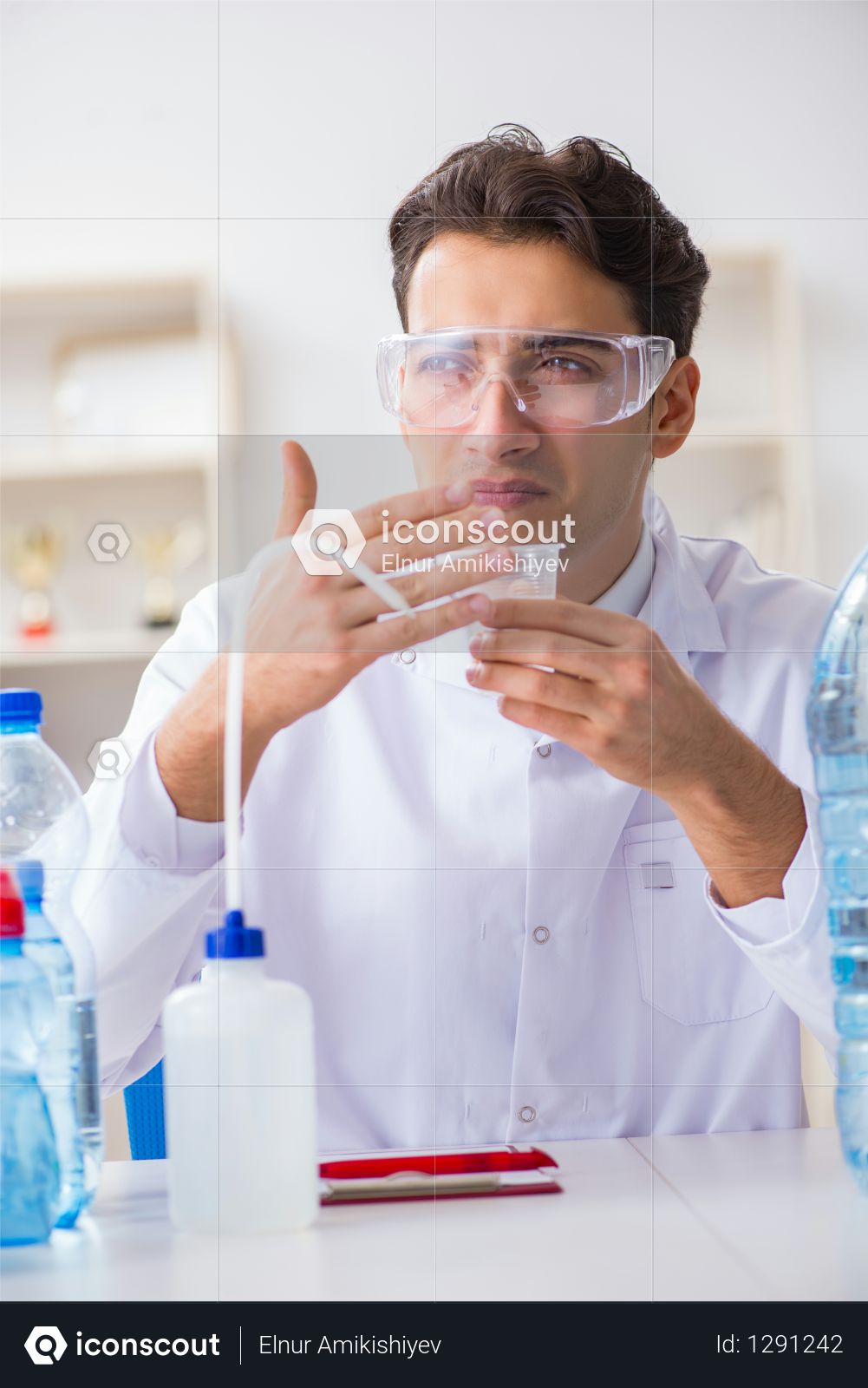 Lab assistant testing water quality Photo