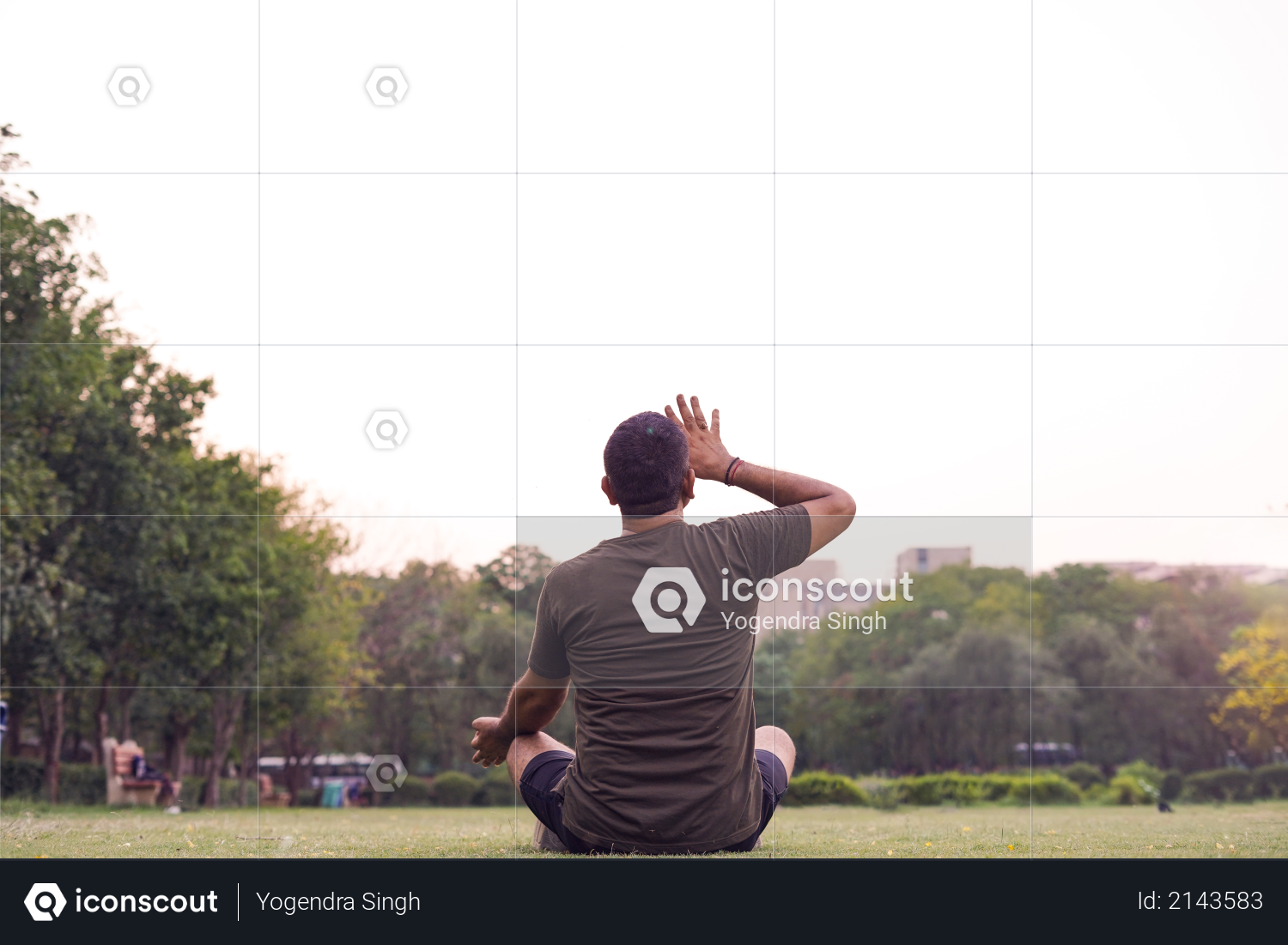 Mid-aged Man doing yoga in a park covered with trees, anulom vilom pranayam Photo