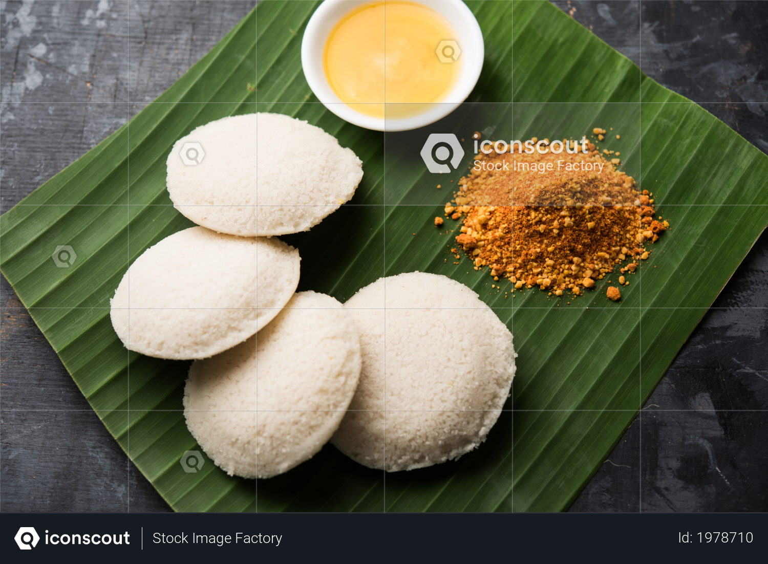 premium podi idli made from leftover idli with green and coconut chutney or sambhar with dal served on banana leaf photo download in png jpg format premium podi idli made from leftover idli with green and coconut chutney or sambhar with dal served on banana leaf photo download in png jpg format