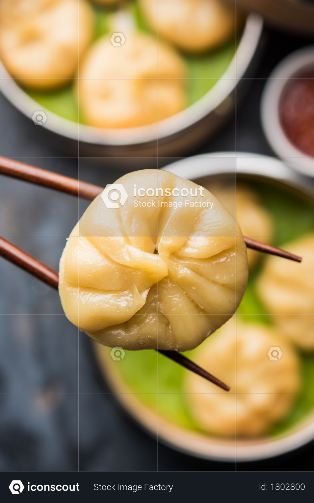 premium selective focus on dumpling momos in chopstick photo download in png jpg format premium selective focus on dumpling momos in chopstick photo download in png jpg format