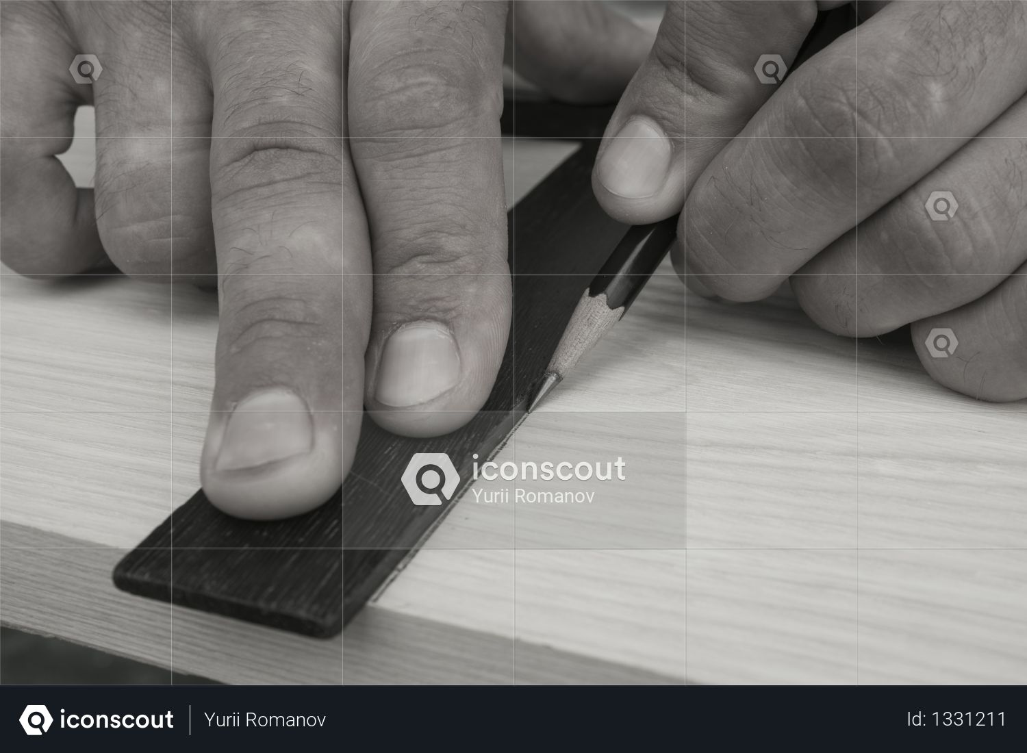The joiner marks the workpiece with a pencil. joinery. carpenter. woodworker Photo