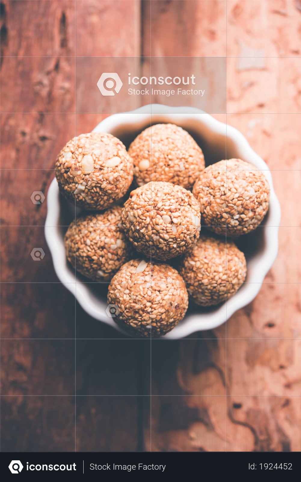 premium til gul or sesame laddu served in plate or bowl over moody background selective focus photo download in png jpg format iconscout