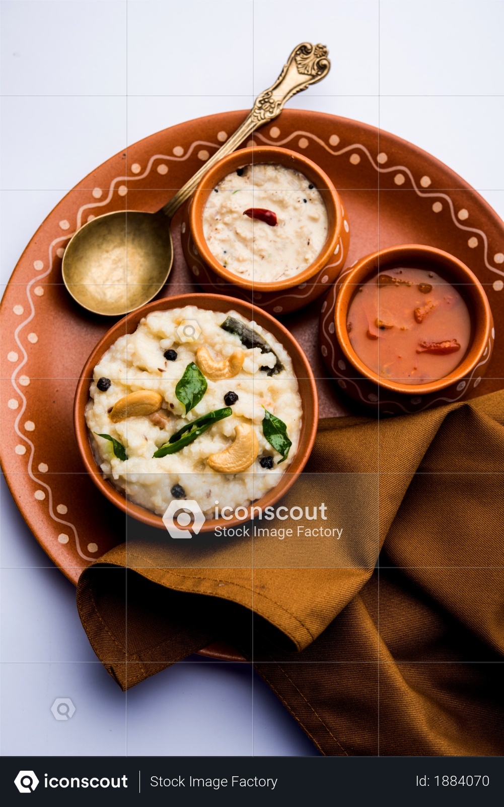 premium ven pongal recipe is a popular south indian food prepared with rice moong dal and served with sambar and coconut chutney selective focus photo download in png jpg format iconscout