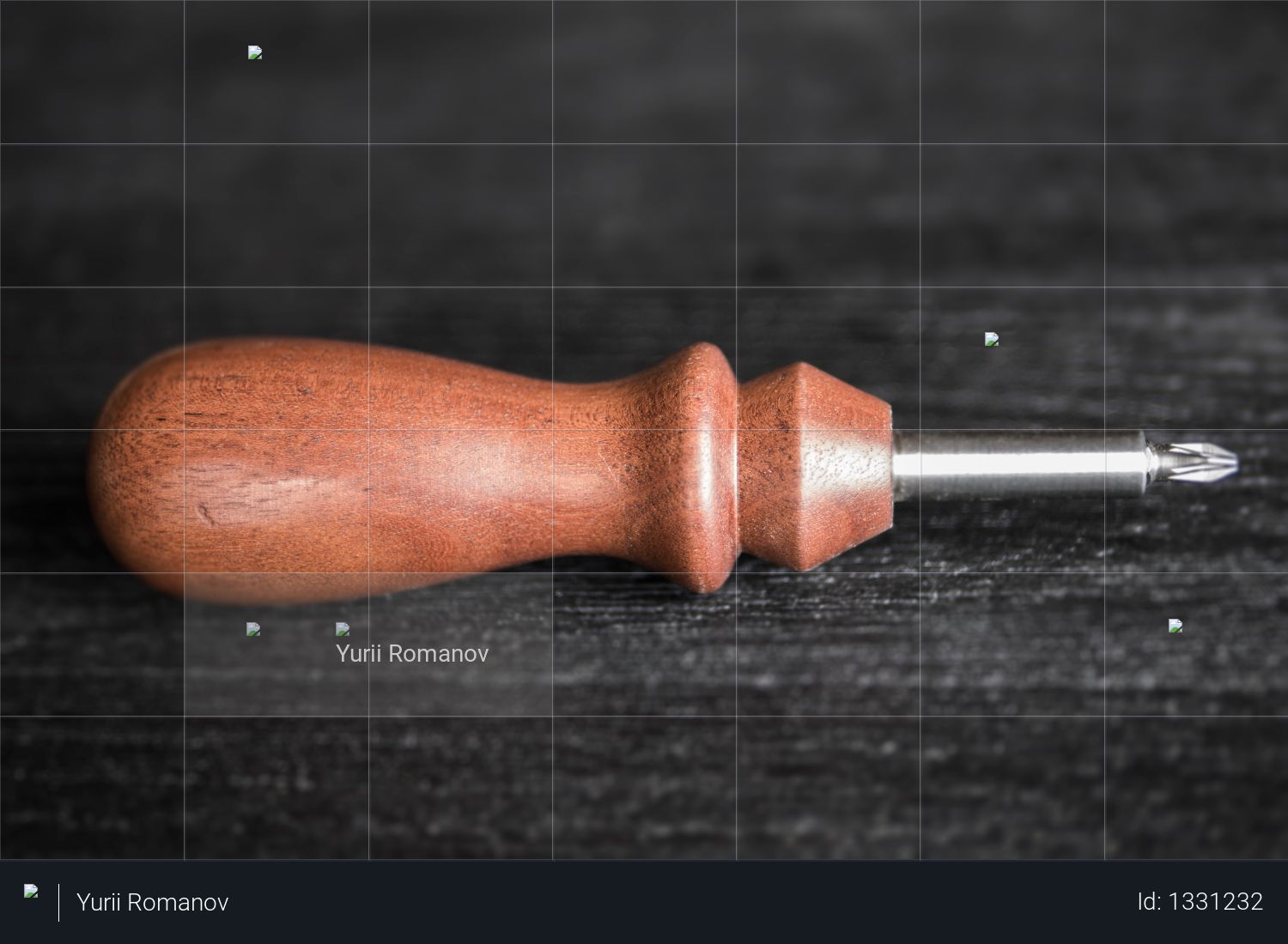 Vintage mahogany screw on a black background Photo