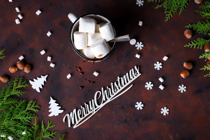 Christmas Tree Branches With Christmas Toys And Cup Of Hot Cocoa Marshmallow With Merry Christmas Cutout Photo