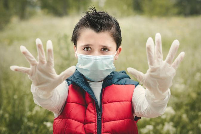 Download Premium Close Up Of Kid Wearing Medical Mask Over Yellow Background Photo Download In Png Jpg Format PSD Mockup Templates